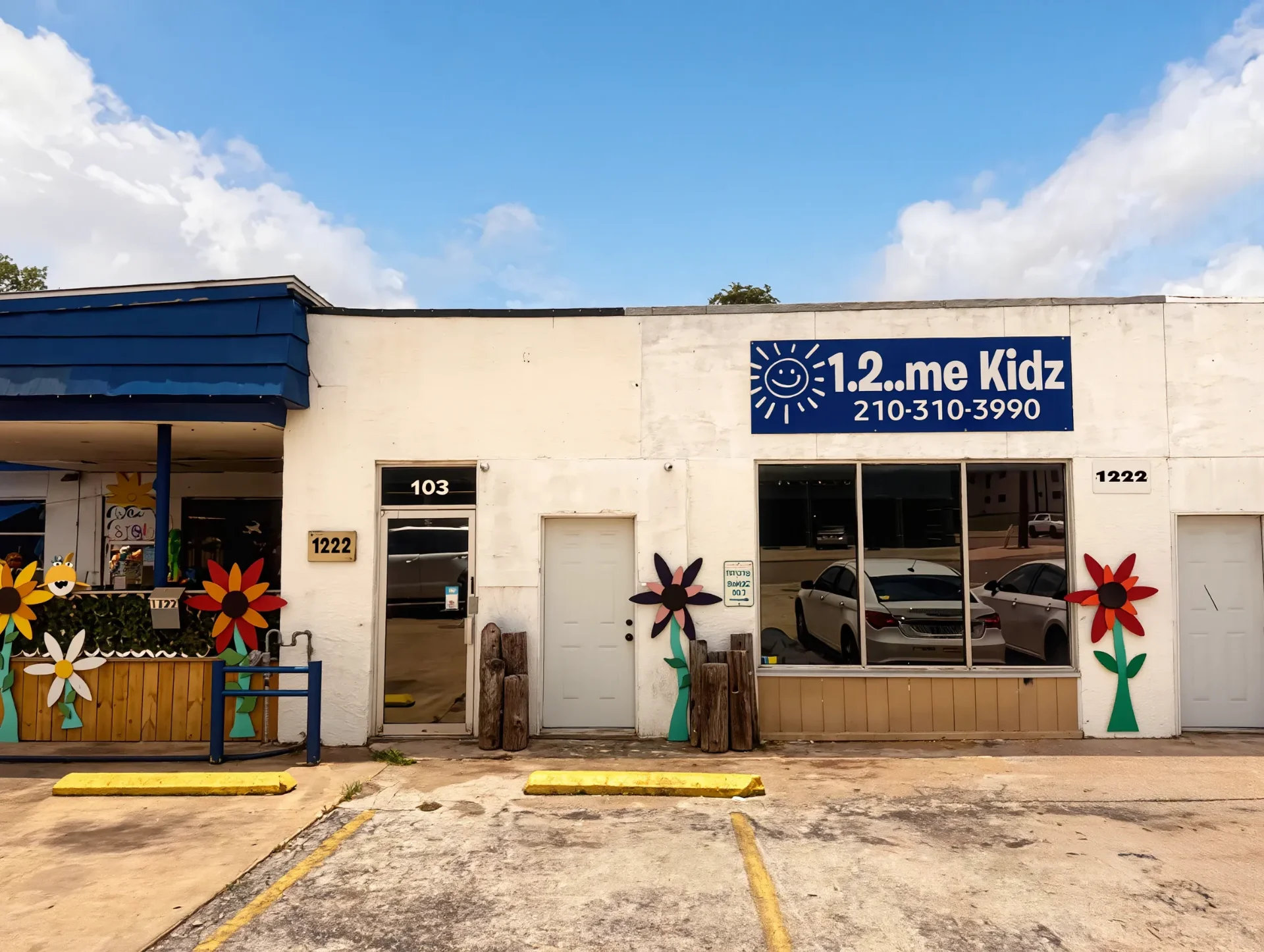 1.2..me Kidz storefront sign with the smiling sun mark and phone number 210-310-3990